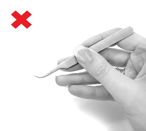 comment tenir pince extension cils